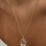 CLEAR OVAL PENDANT - PERIDOT